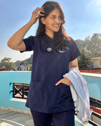 Female Doctor scrub top made from cotton stretchable fabric in navy blue colour